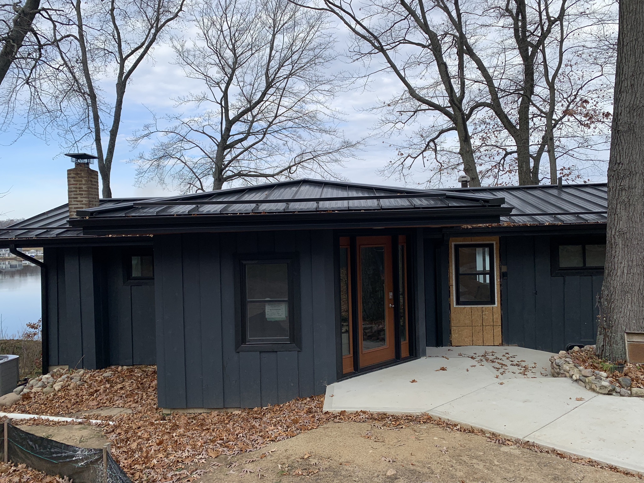 Steel door with decorative glass panels for a modern Kalamazoo residence