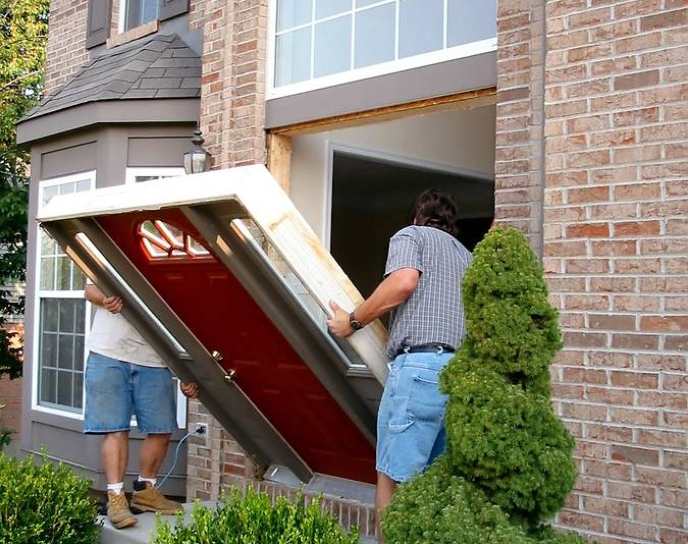 Skilled technician from ADoorable Kalamazoo installing a durable and stylish front door in Richland home