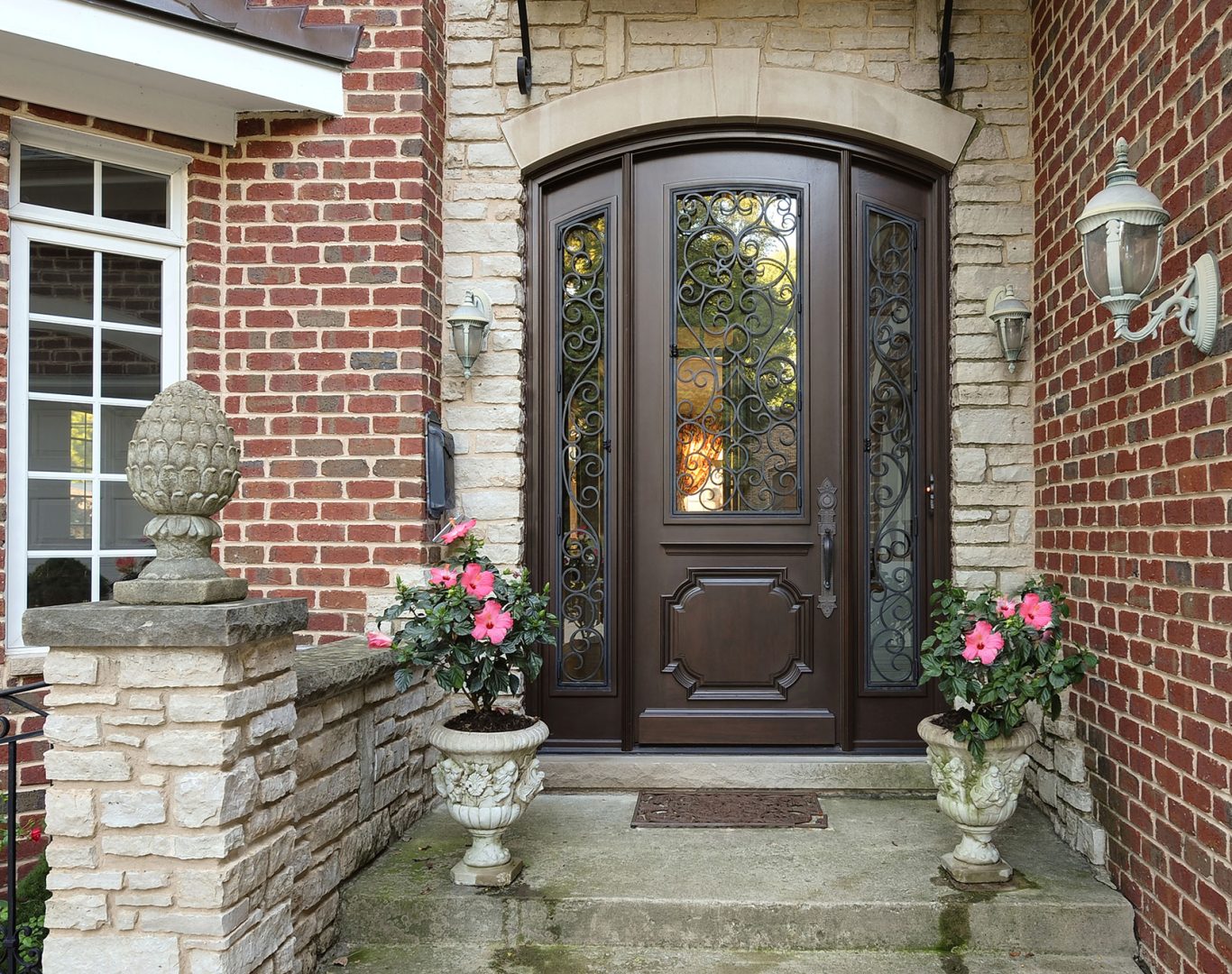Skilled technician inspecting a worn entry frame before installing a replacement door
