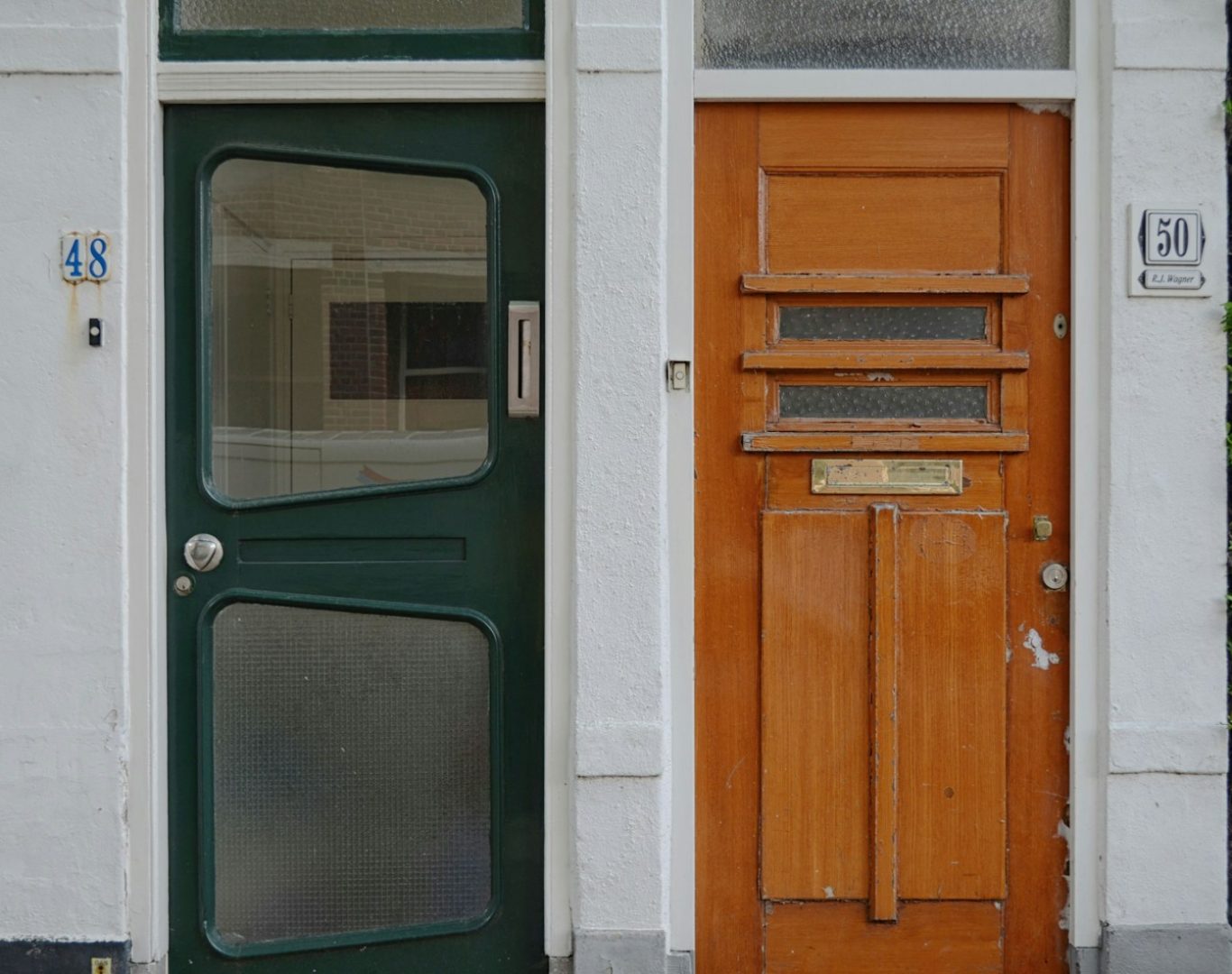 Modern entry doors installation in Mattawan MI home exterior