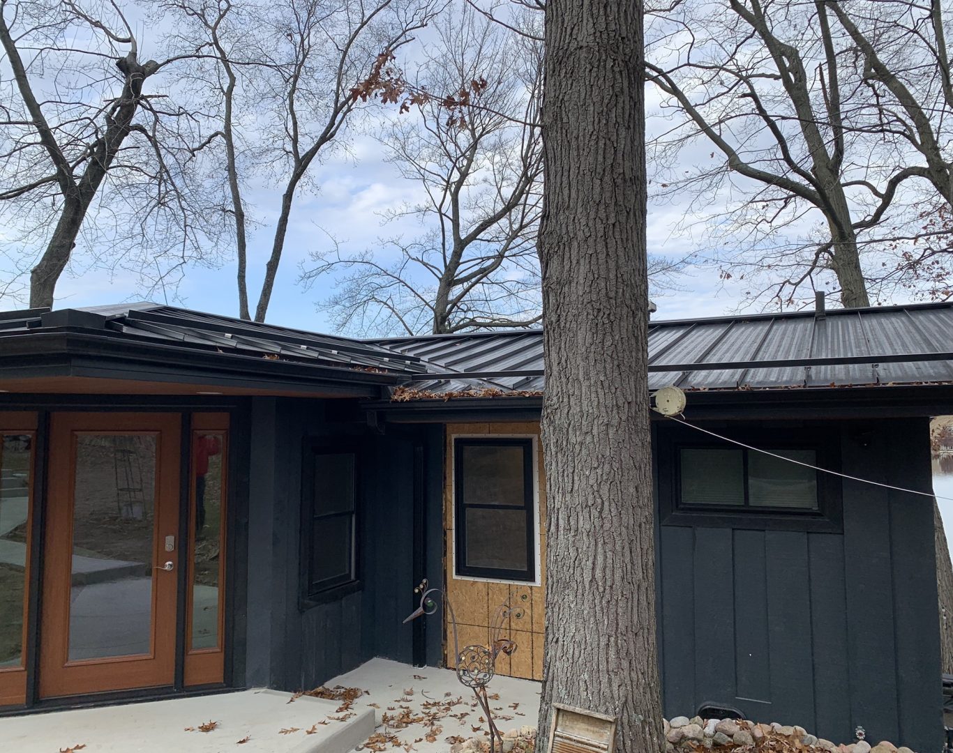 Experienced technician from ADoorable Kalamazoo performing precise front door installation
