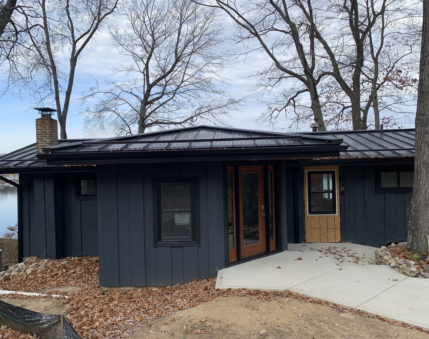 Steel door with decorative glass panels for a modern Kalamazoo residence